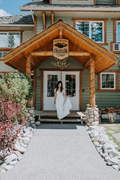 Bride outside venue entrance 