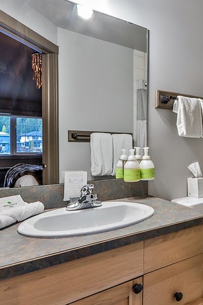 Refillable soap containers in a bathroom