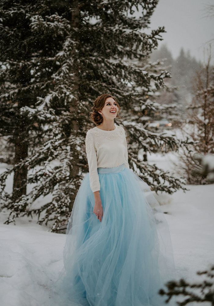 winter bride with blue skirt