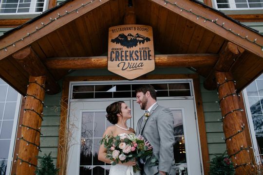 bride and groom, outside venue