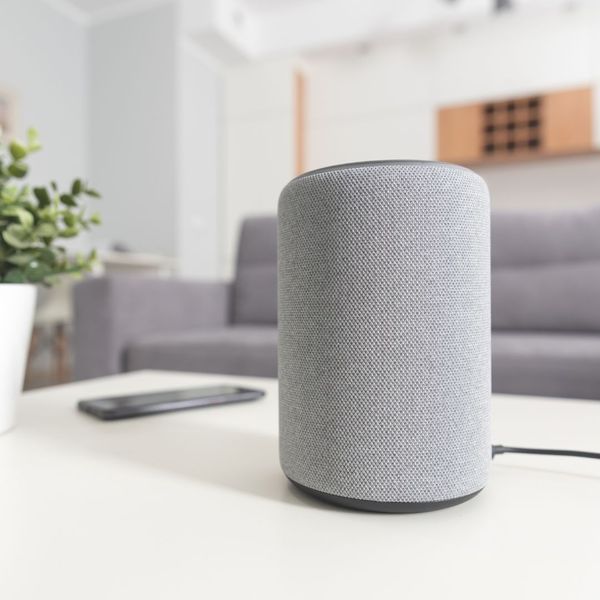 A speaker on a coffee table