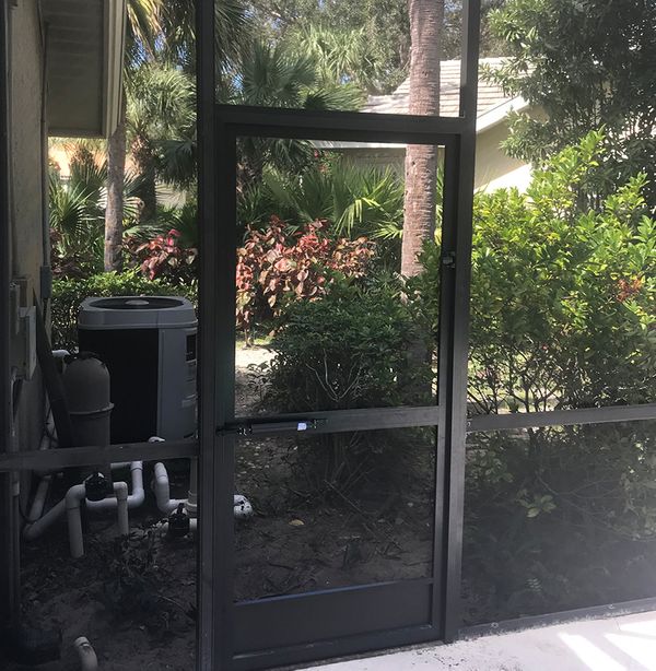 Enclosure and screen door