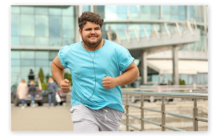 man jogging and smiling