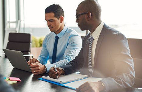 3 businessmen in a meeting