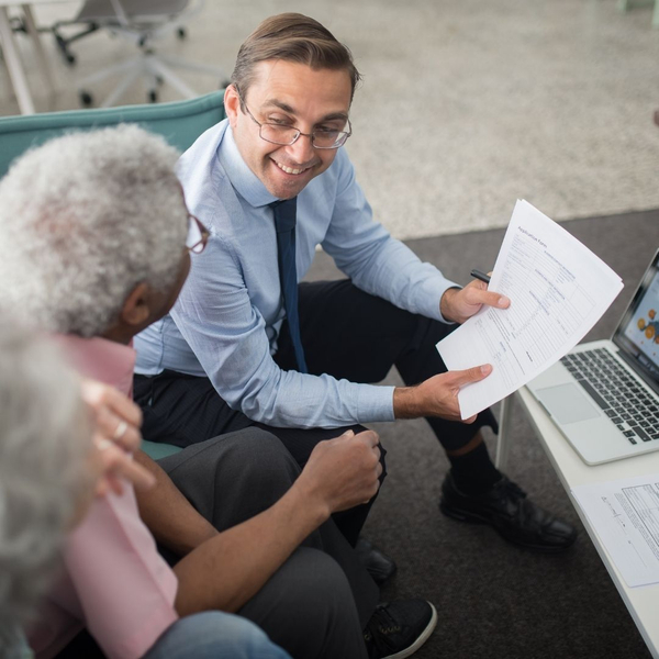 Accountant speaking to a senior couple