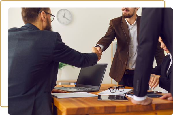 shaking hands with an insurance agent