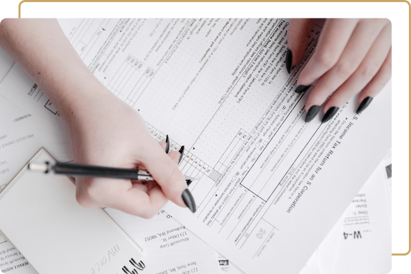 image of a woman doing taxes