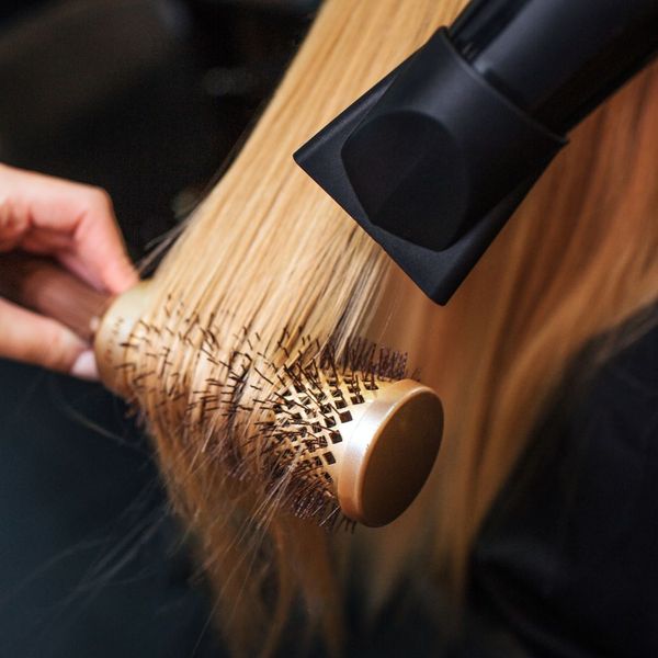 woman with blonde hair getting a Brazilian Blowout