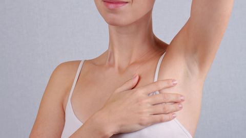 Woman with hairless armpits