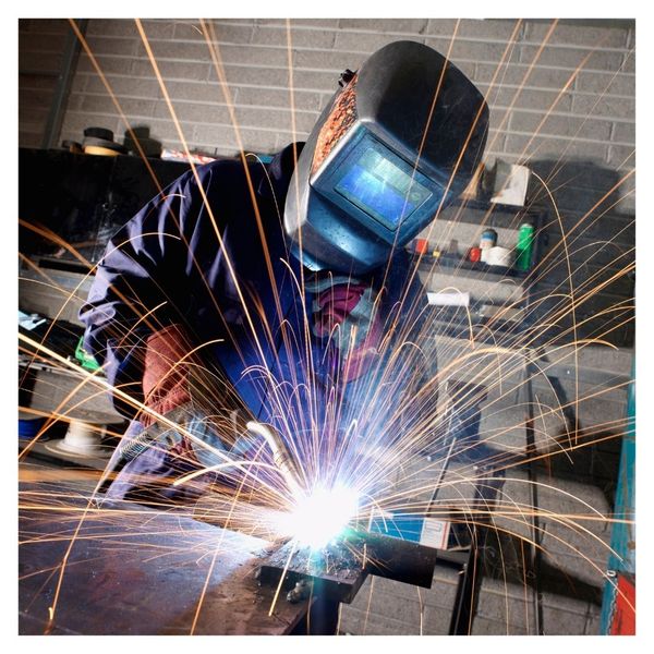 person welding