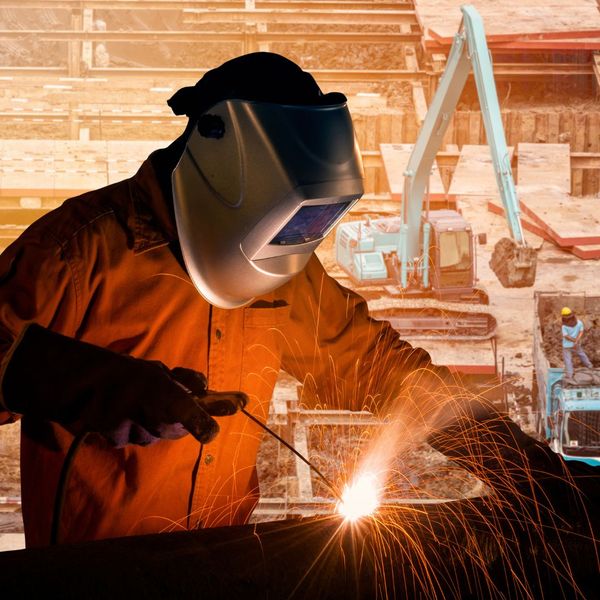 welding working on steel structure on construction site