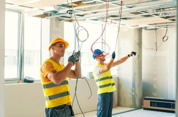 electricians working on wiring