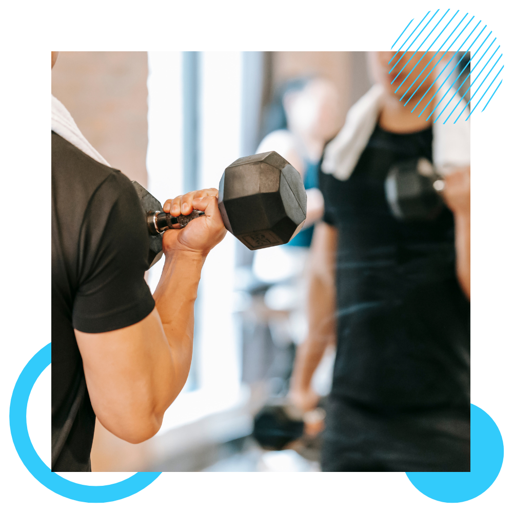 A man working out in front of a mirror.