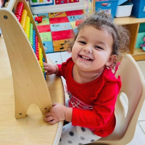 A little girl smiling
