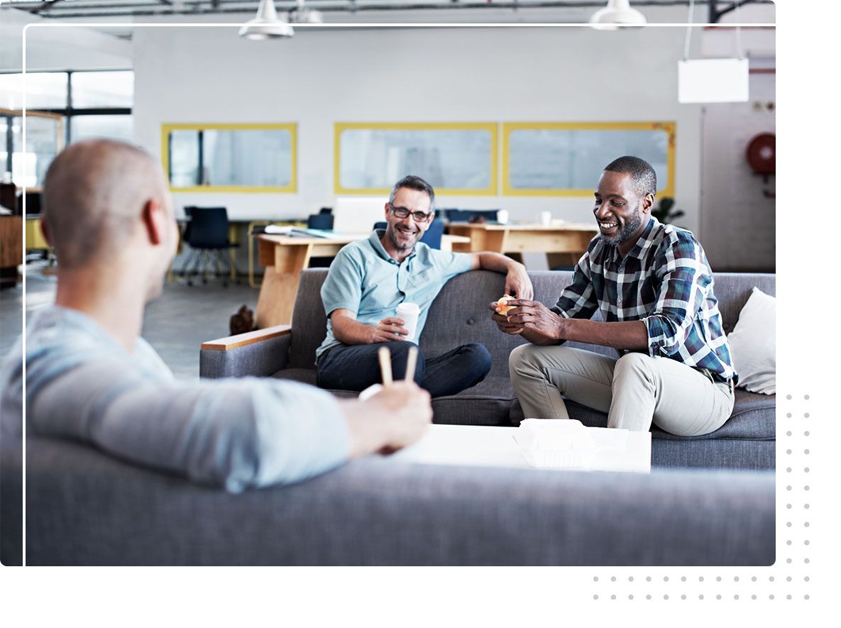 group of men hanging out in break room