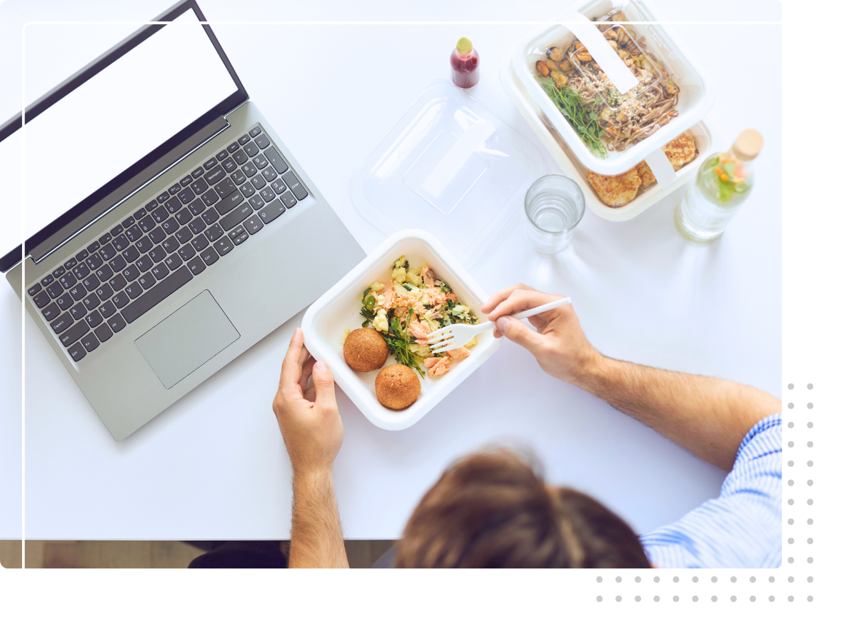 person eating healthy lunch at table