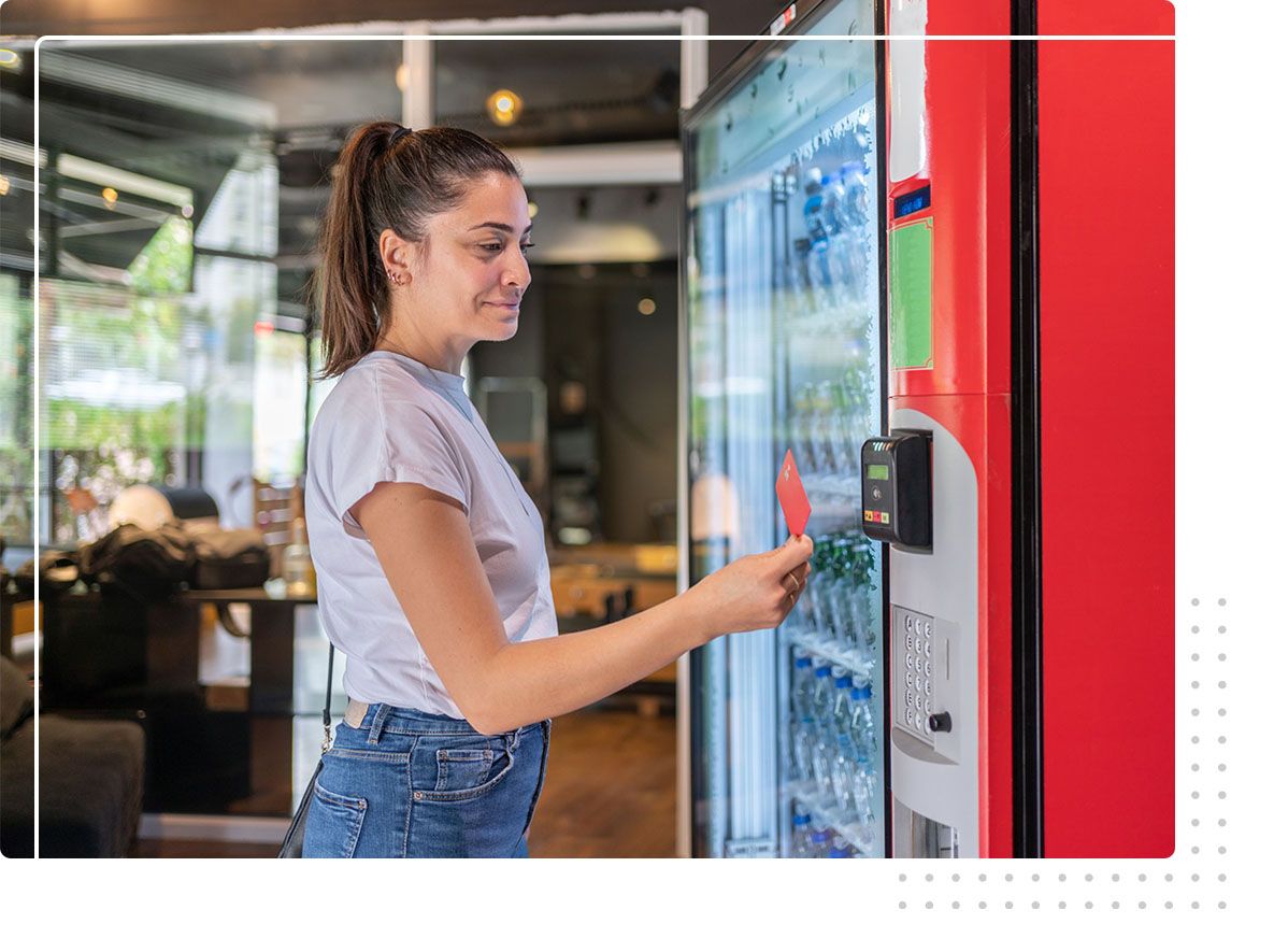 woman using vending machine