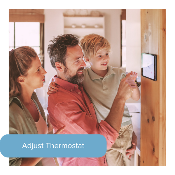 family adjusting thermostat