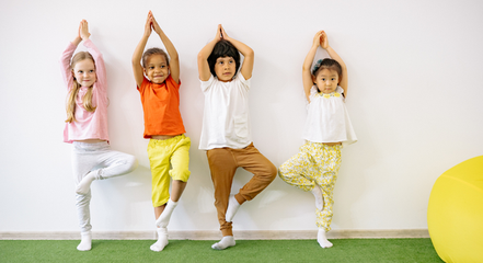 kids doing yoga stretches.
