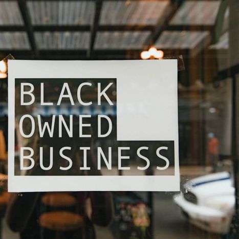 Black Owned Business sign in store window