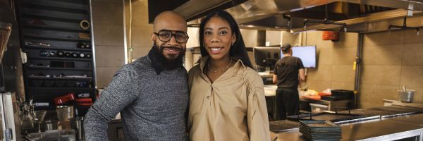 Husband and Wife Entrepreneurs in their restaurant