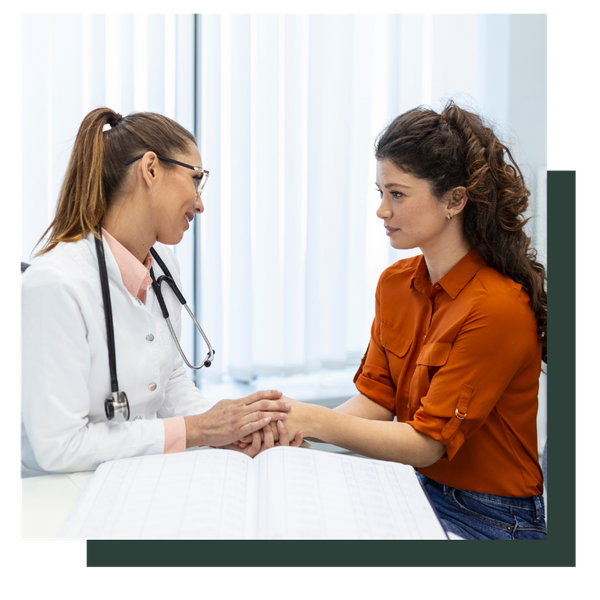 A woman speaking to her doctor