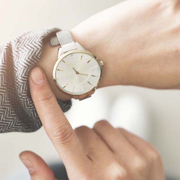 Woman looking at watch