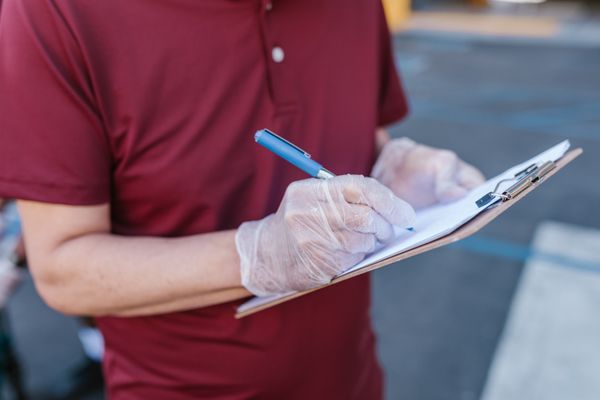 a man is preparing a medical cleaning checklist