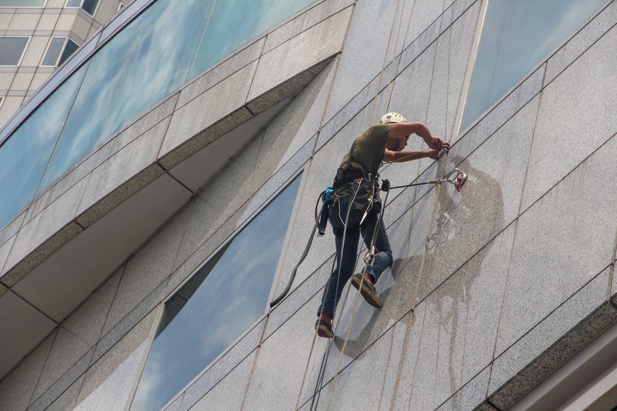 a man is doing industrial cleaning