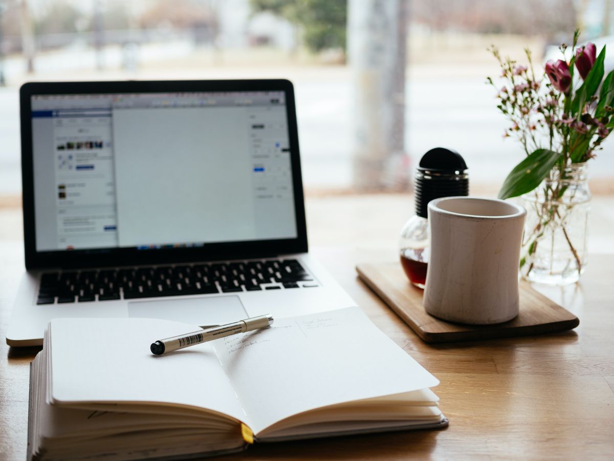 computer, table and coffe of a cleaning business