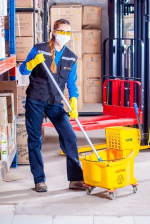 a women is doing professional industrial cleaning