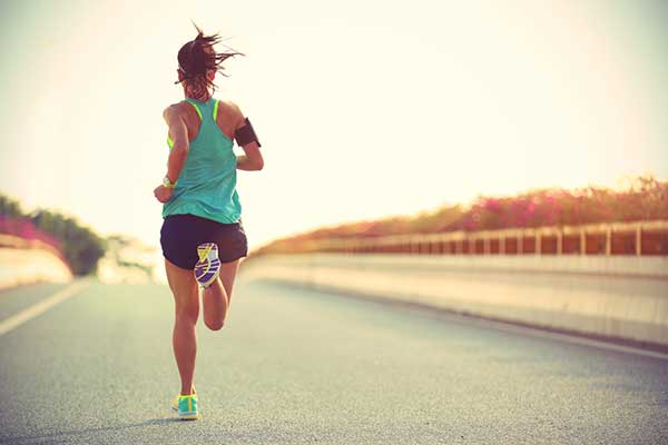 image of a woman running