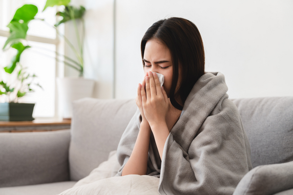 Image of a woman with a cold