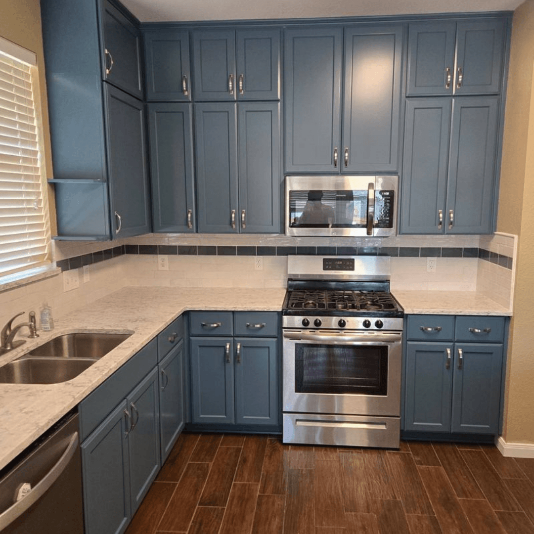 remodeled kitchen with blue cabinets