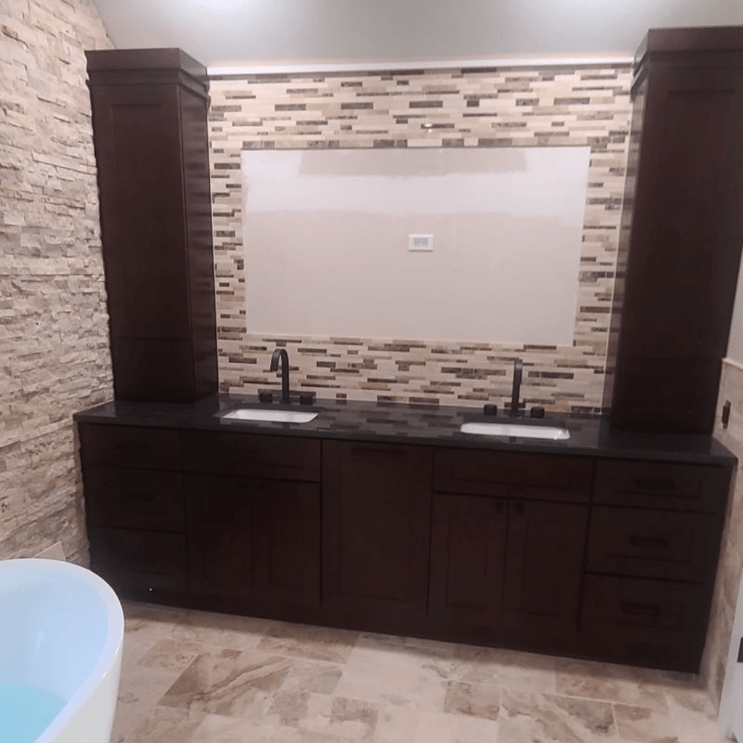 remodeled bathroom with tile wall