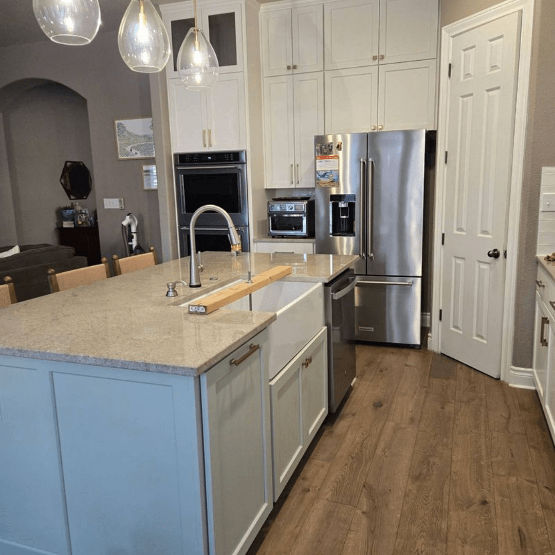 newly renovated kitchen with white cabinets