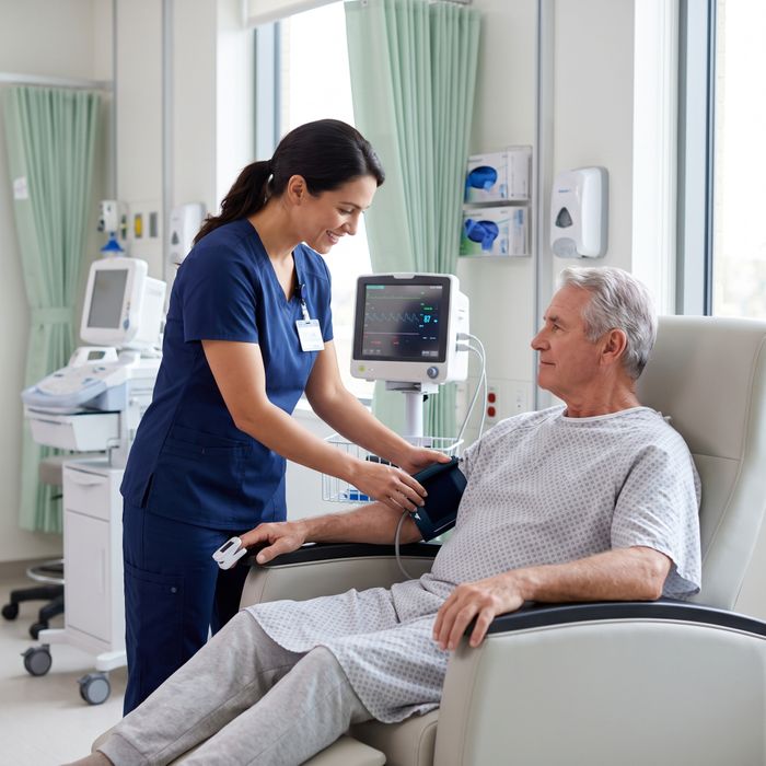 Compassionate doctor explaining procedure to patient in office.