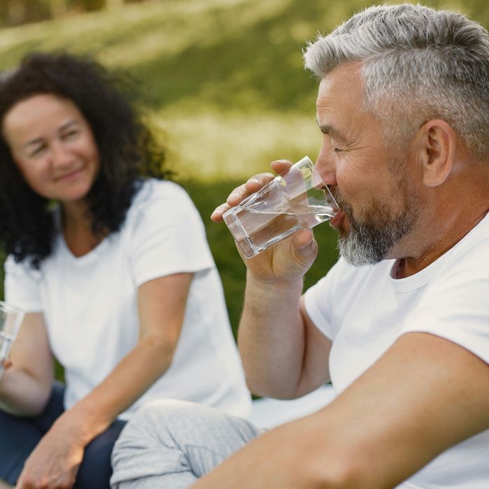 Man drinking a glass of water