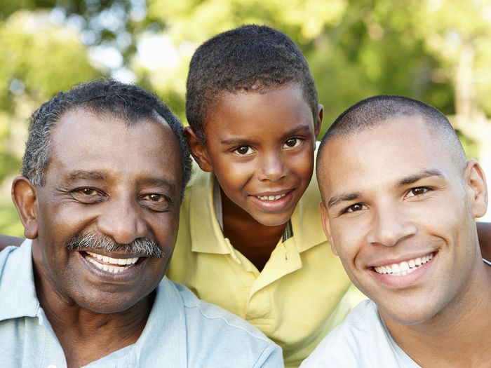 Black grandfather, son, and grandson