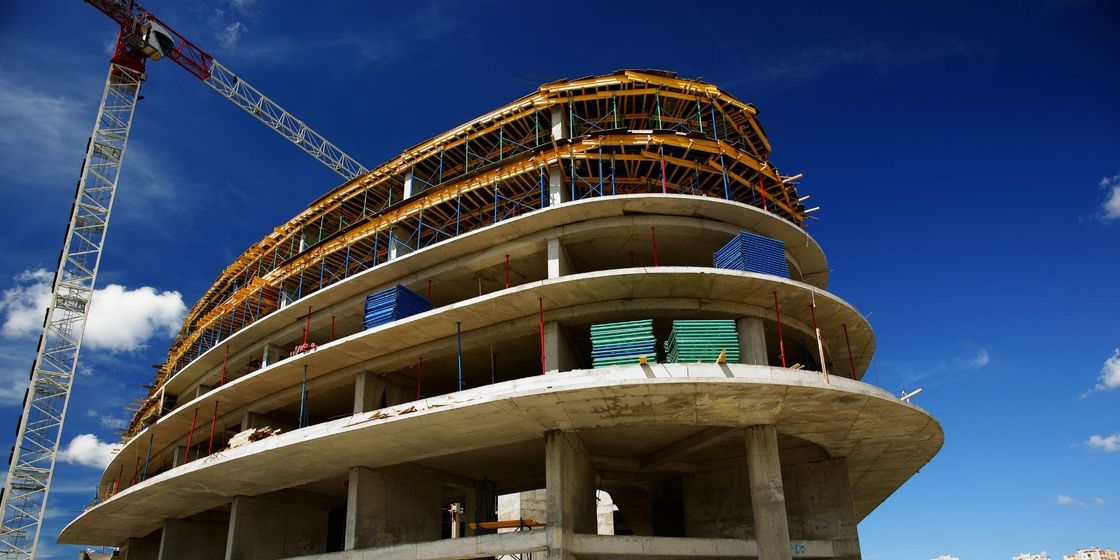 crane over building in the process of being constructed