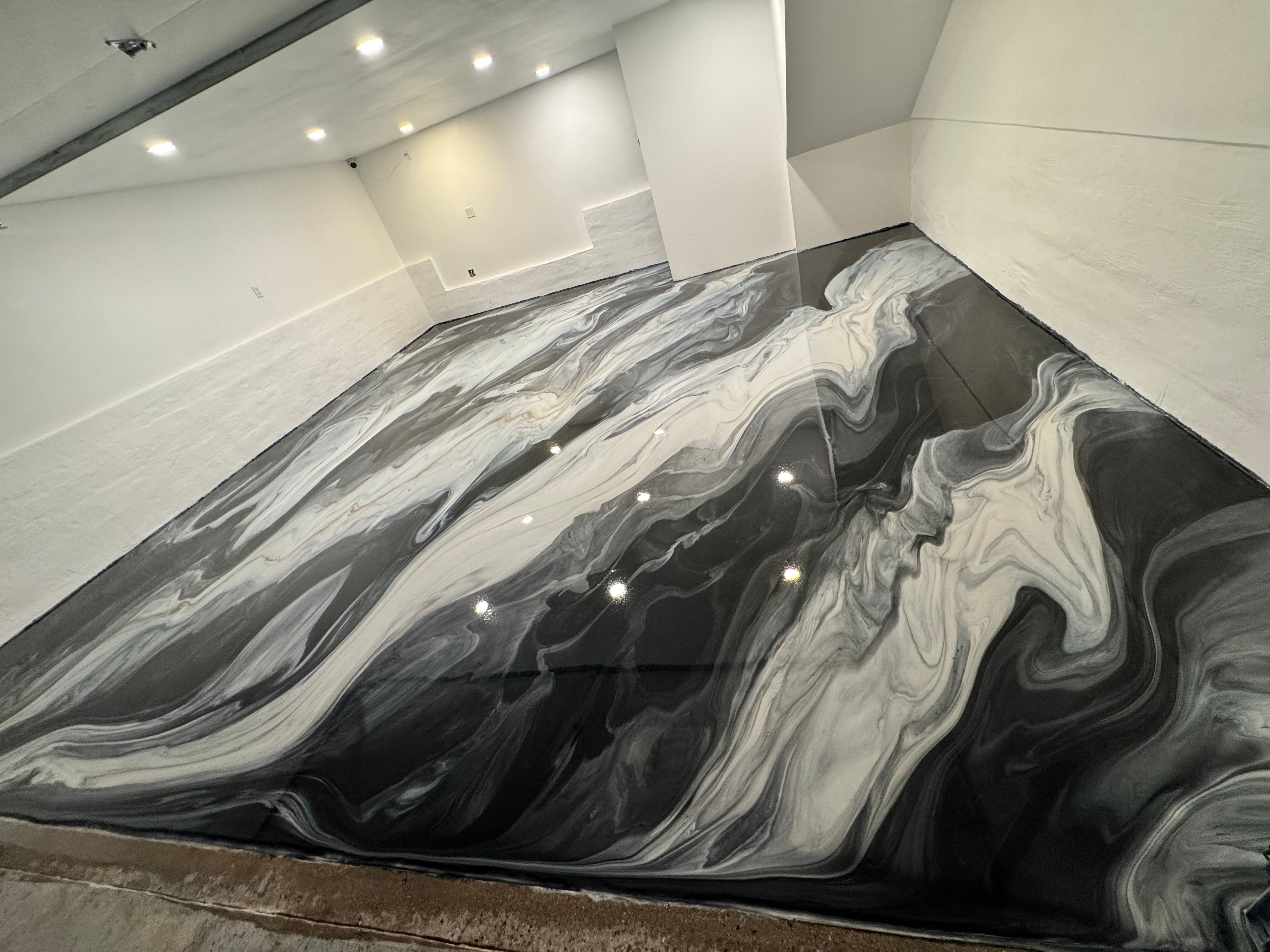 Luxury Metallic Epoxy Floor Installed by Warrior Epoxy