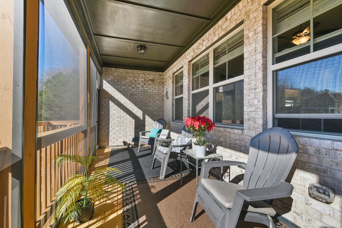 BACK COVERED AND SCREEN PORCH WHERE YOU'LL ENJOY AMAZING SUNSETS.