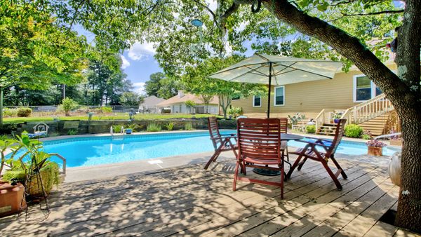 The back yard w/pool