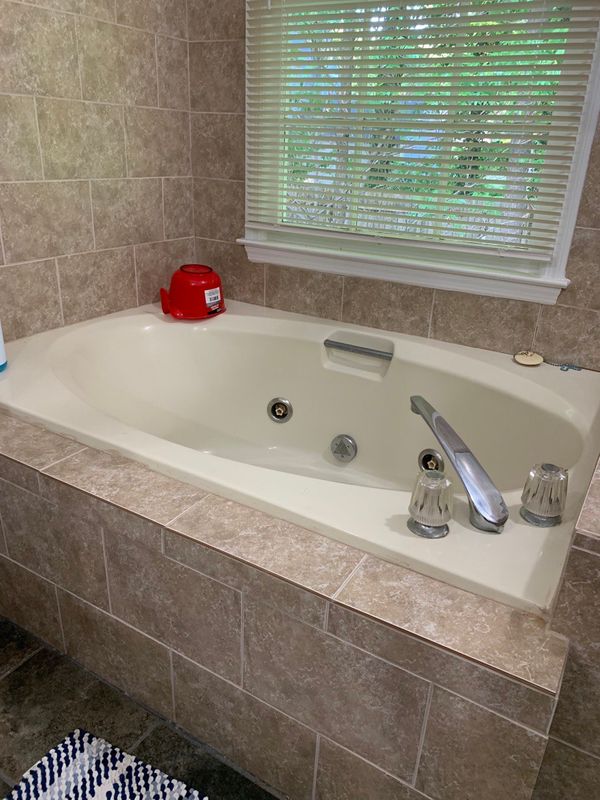 Separate jetted tub