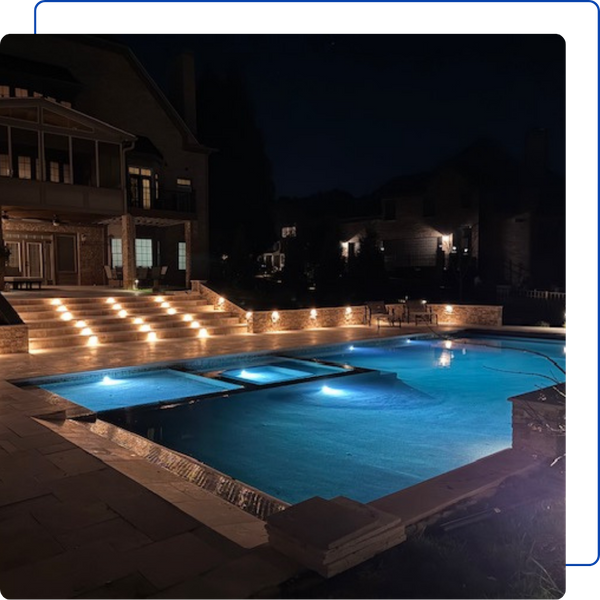 custom poolscape at night