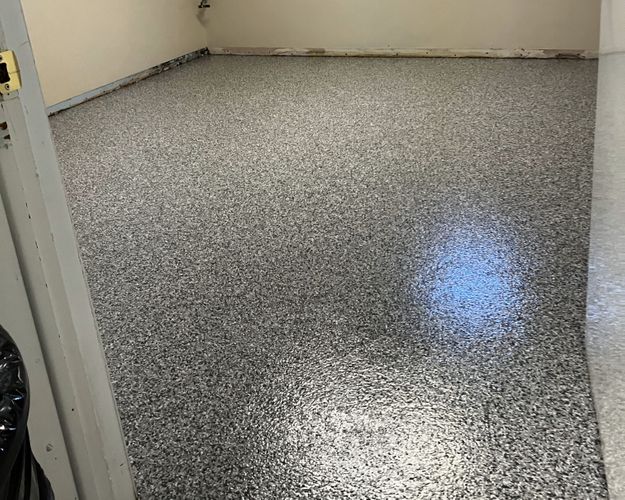 Gravel Polyaspartic Flake Flooring by Revolutionary Floor Coatings in Vet Surgery Suite Room 2