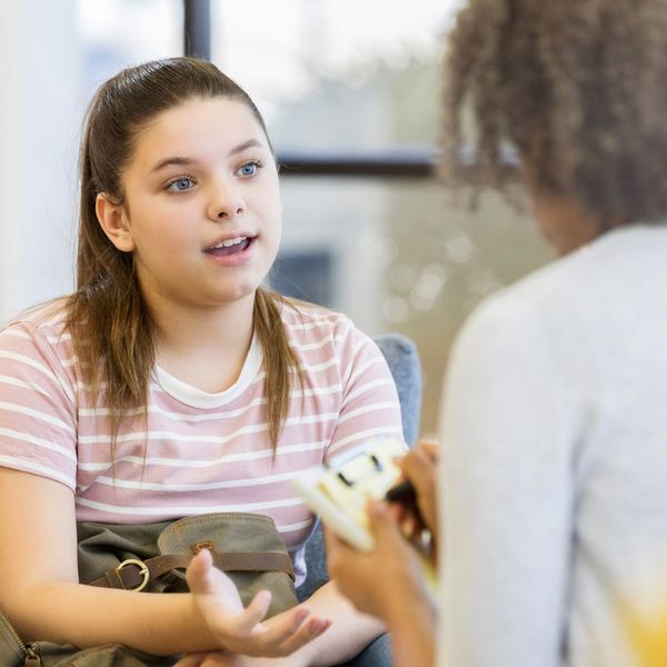 child talking to an investigator