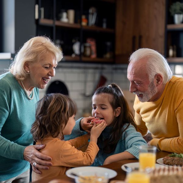 grandparents in the kitchen with their grandchildren