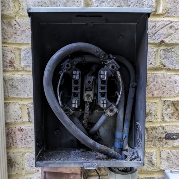 24-hour emergency electrician total power outage burned meter base
