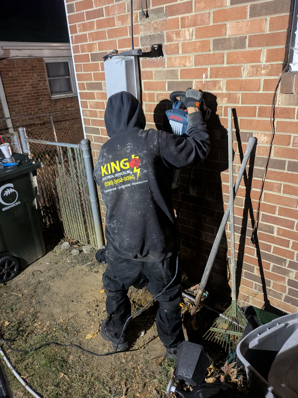 24-hour emergency electrician replacing 200-amp panel after surge—King Electrical Services